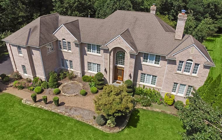 Protect Your Malvern Property From Rodent Infestations aerial view of a large home in malvern pennsylvania