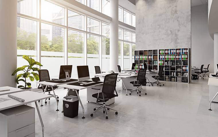 desks and chairs in an office space needing commercial pest control
