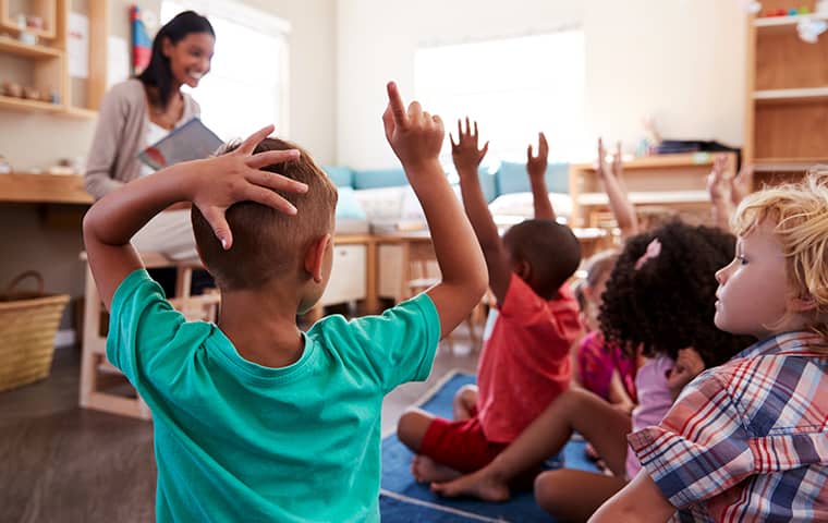 Pests Spread Bacteria & Disease To Your Children a group of students and a teacher inside of a classroom serviced by bugaboo pest control in new jersey
