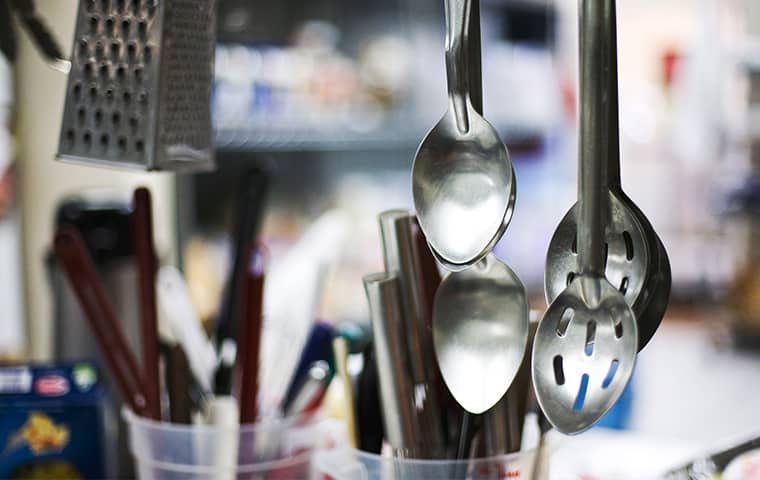 cooking utensils hanging in a kansas city missouri commercial kitchen