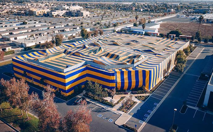 building in a fumigation tent