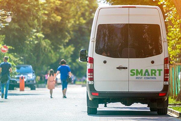 a smart pest control company van