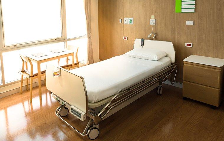 a hospital bed protected by commercial pest control