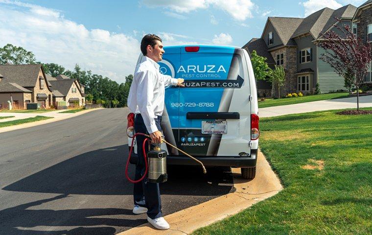 a pest control service technician arriving at a home in fort mill south carolina