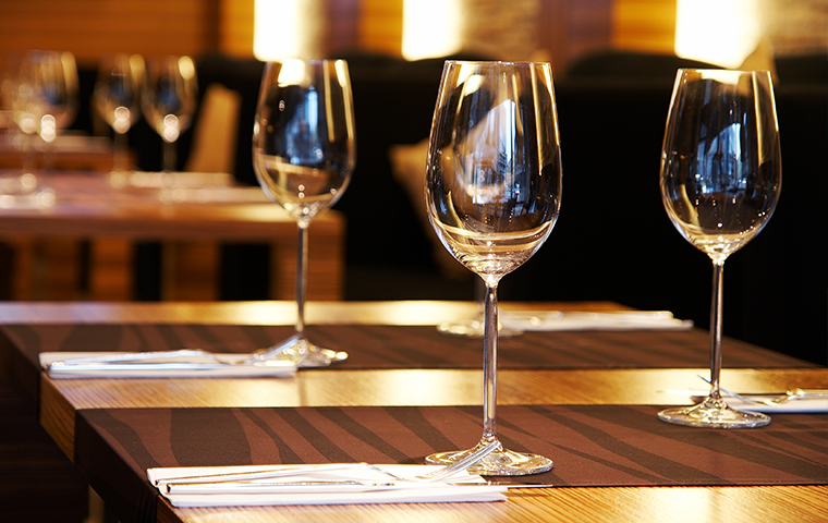 close up of wine glasses on a clean restaurant table