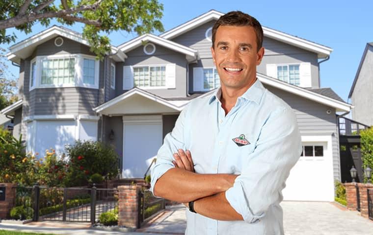 Bug Head Uses Family & Pet Safe Products a technician standing outside a home in plano texas