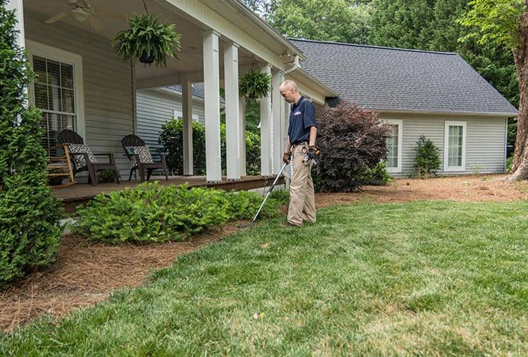 Termite Control Starts With A Thorough Inspection spencer service professional inspecting property for termites