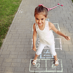 girl playing outside during spring