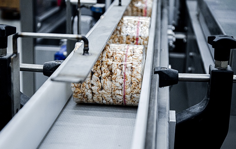 food being packaged in a food processing plant