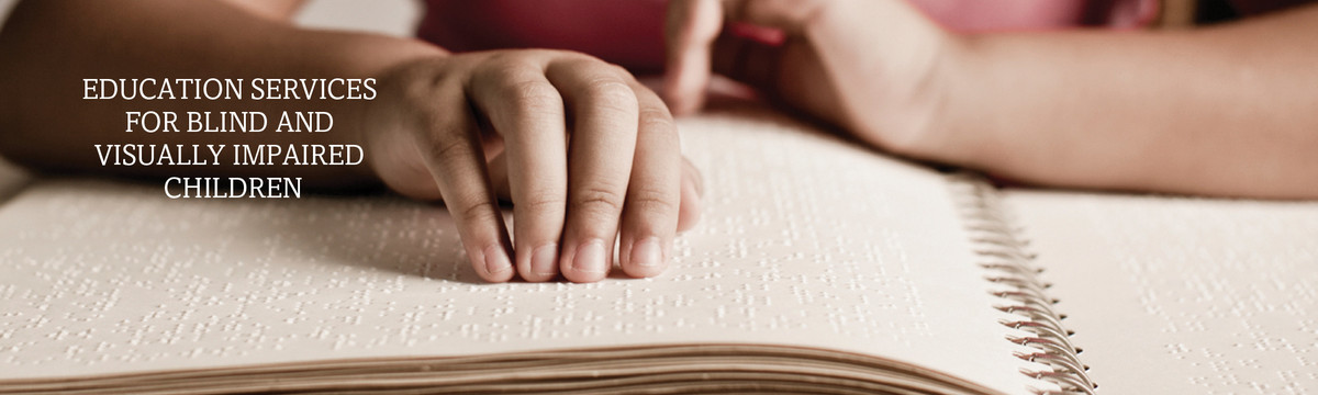 Child reading Braille. We offer assessment, instruction and consulation to support blind and visually impaired children.