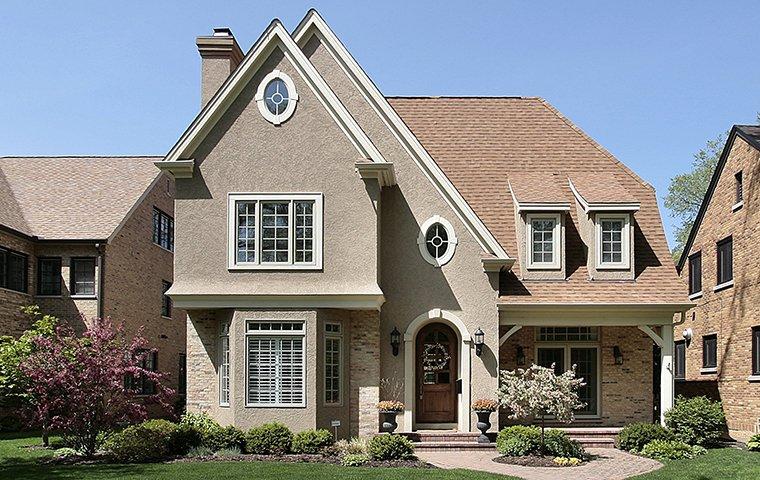 street view of a large brick home in frisco texas