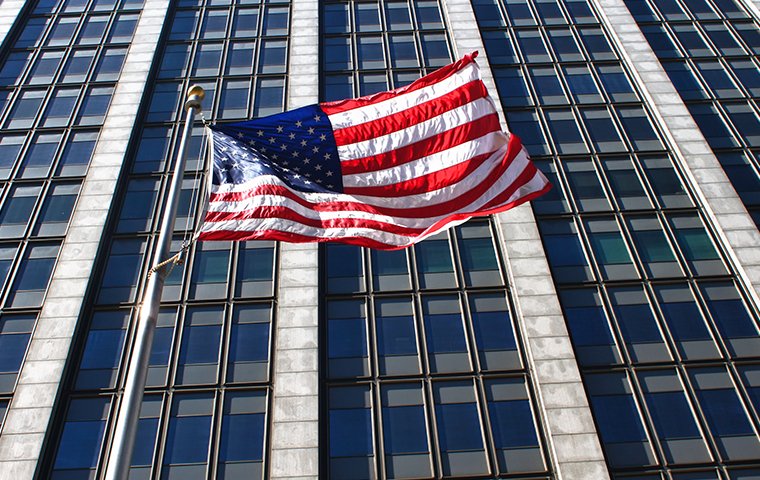 a large government building with an american flag