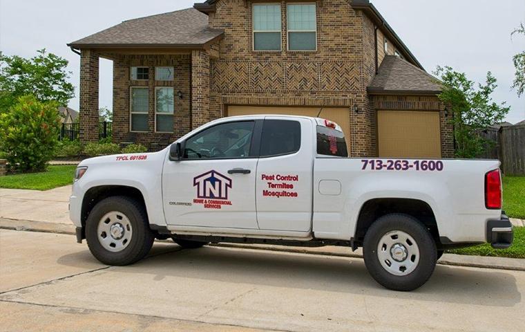truck parked in front of house
