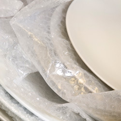 plates wrapped with bubble wrap
