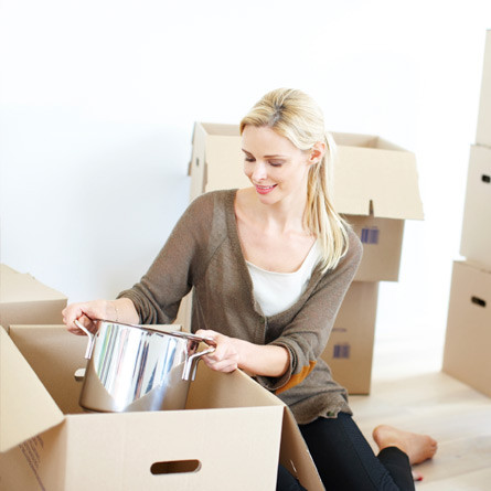 woman packing boxes