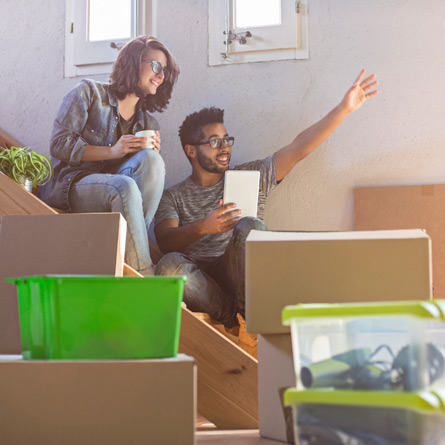 couple getting ready to pack boxes