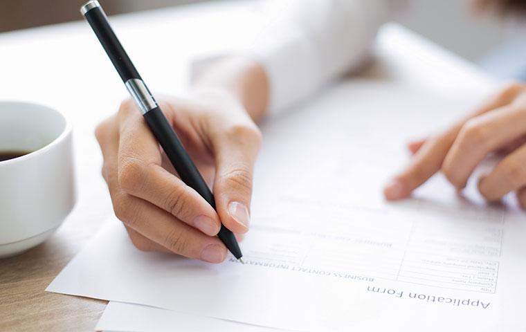 a person filling out an application