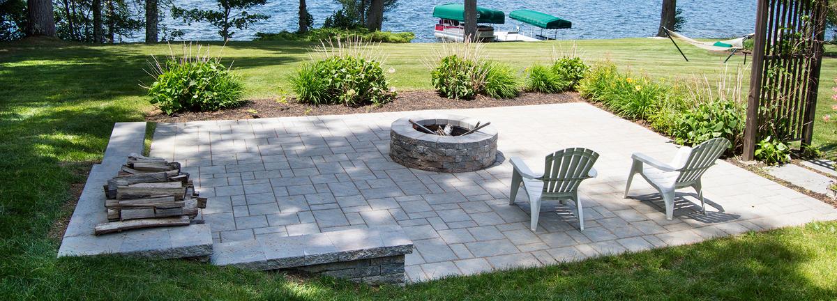 Stone patio with a fire pit