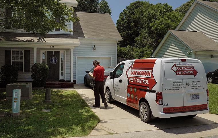 tech and vehicle outside home