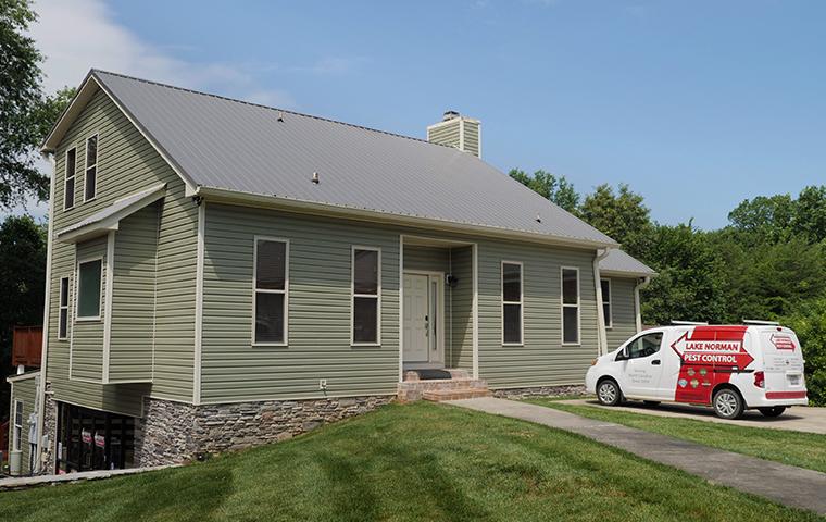 home with a company van out front