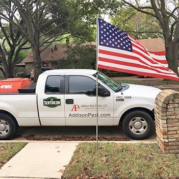 a company vehicle parked outside a home in dallas texas