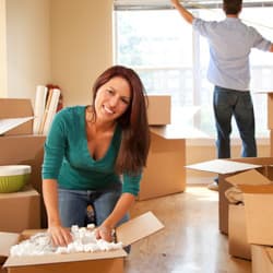 You Want To Protect Your New Home From Pests Just Like You Did Your Old Home, Tell Thomas You Are Moving And We Will Handle The Rest woman unpacking from move
