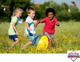 Learn More About Kid Safe Pest Control kids playing in a pest free yard