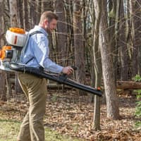 Effective Mosquito Control In Albany NY mosquito control technician treating backyard