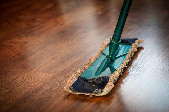 A mop cleaning hardwood floor