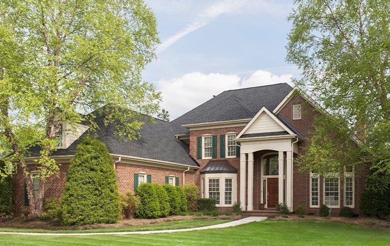 We Will Eliminate Pests From Your Norfolk Home street view of a large house in norfolk virginia