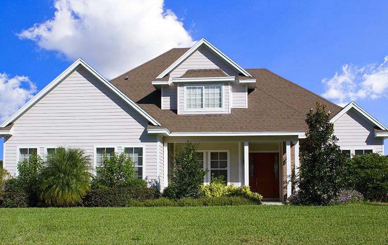 a light gray two story house