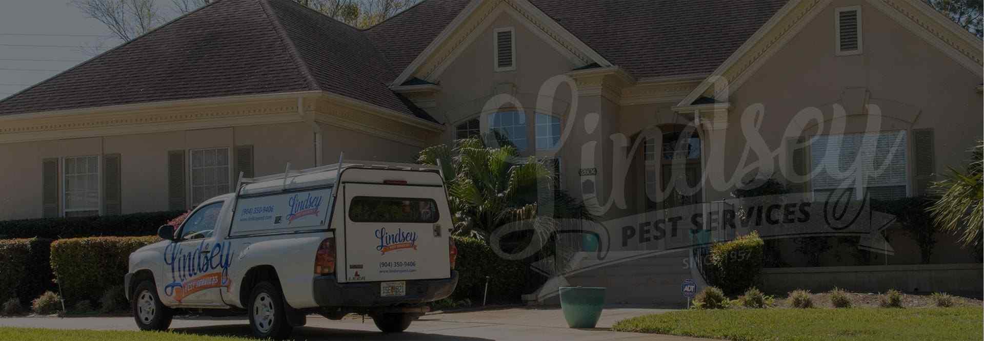a lindsey pest service pest control truck outside of a jacksonville beach home