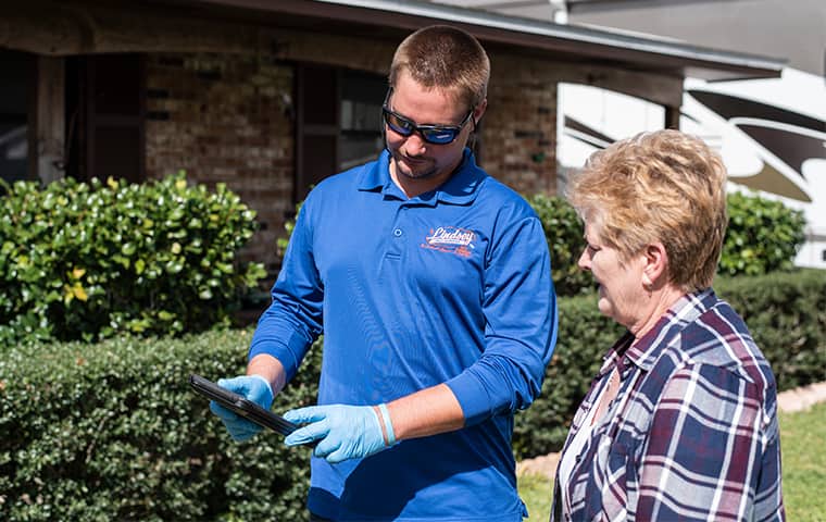 a technician with a residential homeowner in middleburg florida