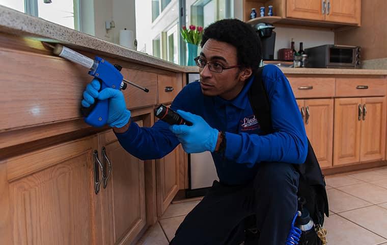 a technician servicing a lakeside florida home