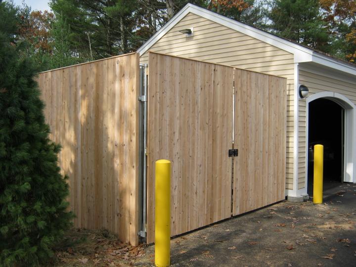 Photo #344, 8' Solid Board Dumpster Enclosure with Thin Cap Strip and Steel Gate Frame