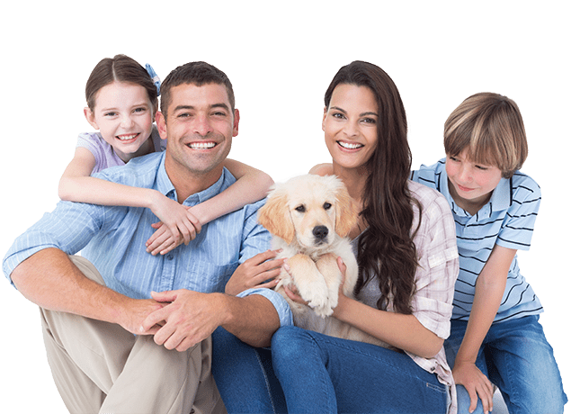 happy family of four posing with their puppy in woodburn oregon