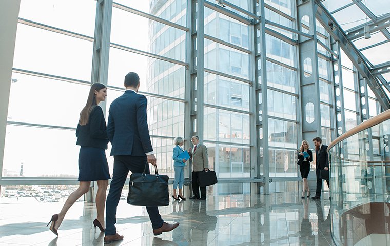 employees walking through a large office building