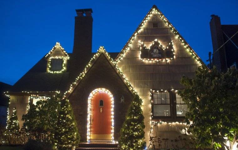 large home with christmas lights