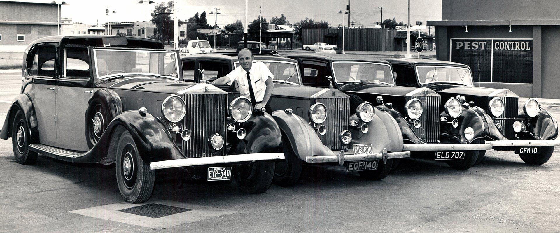 black and white photo of truly nolen owner and company vehicle