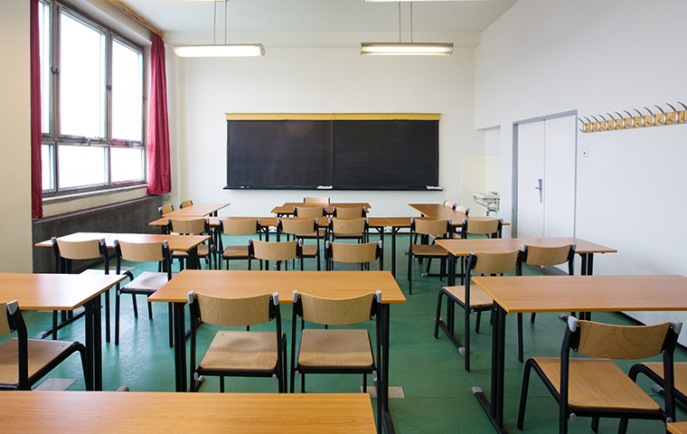 Keep Your Students Safe From Pests interior of an empty classroom in houston texas