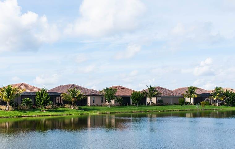 Keep Your Community Pest-Free This Fall a row of condos lined up along a florida waterfront community complex