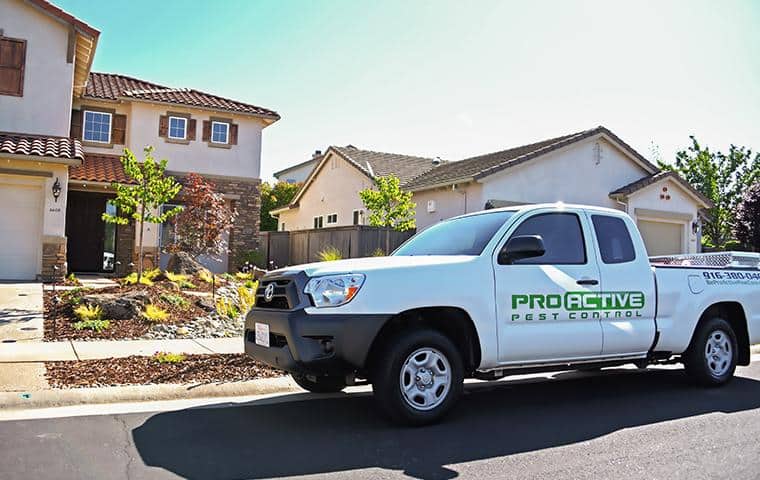 a white service truck outside of a home in elk grove california