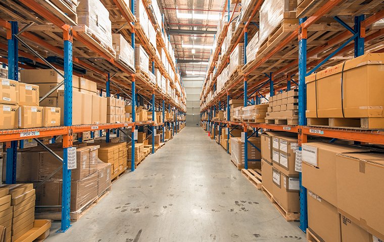 boxes stacked high in a warehouse