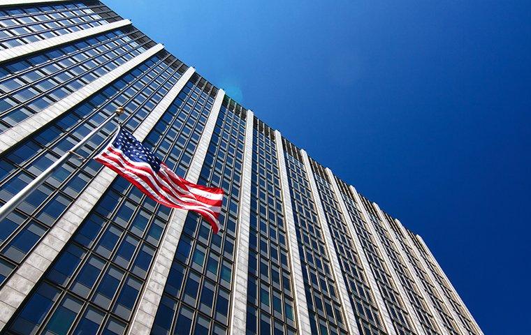 a large government building with the american flag