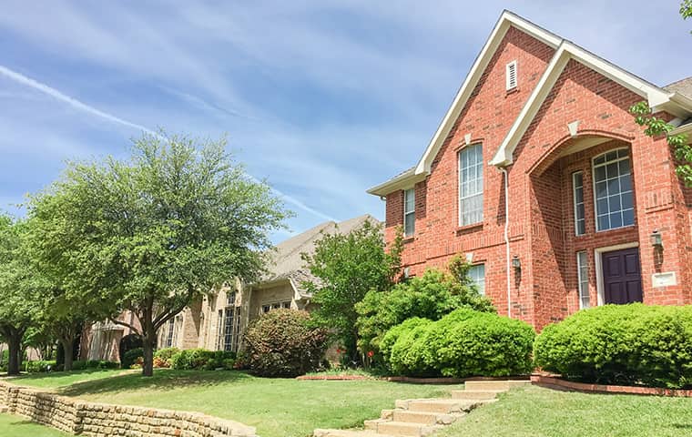 Discover Our Home Pest Control Services In TX street view of a residential home serviced by cantu pest control in houston texas