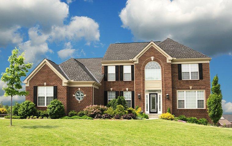 Protect Your Kingwood, TX Home From Invasive Pests street view of a suburban home in kingwood texas