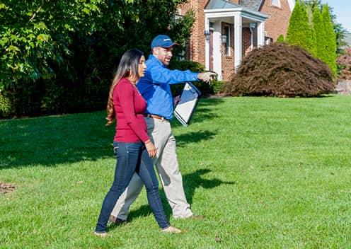 a technician consulting with a homeowner in clarksburg maryland