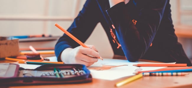 child at desk at school