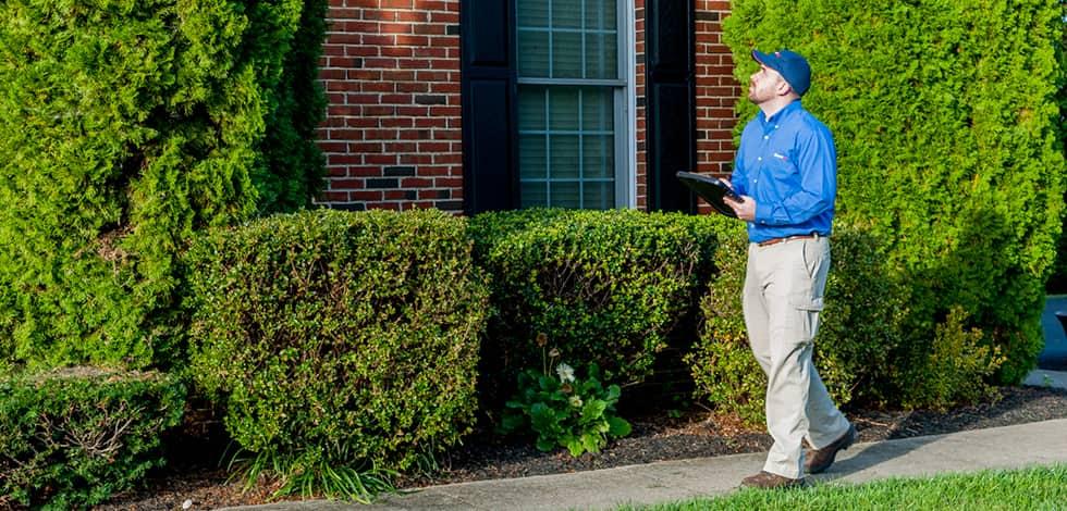 a technician performing an exterior inspection in jessup maryland