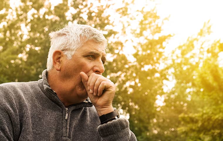Many Pesticides Can Be Hazardous To Your Health a man coughing outside in fairfield new jersey